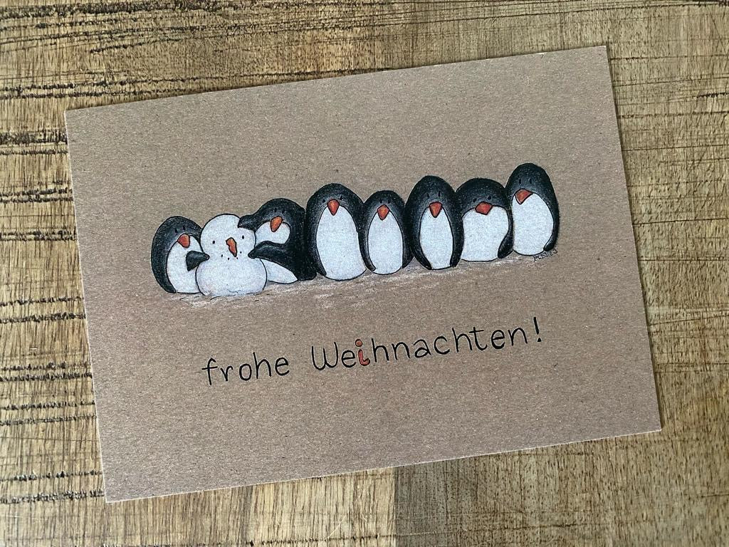 Festtagskarte - frohe Weihnachten! (Pinguine mit Schneemann)